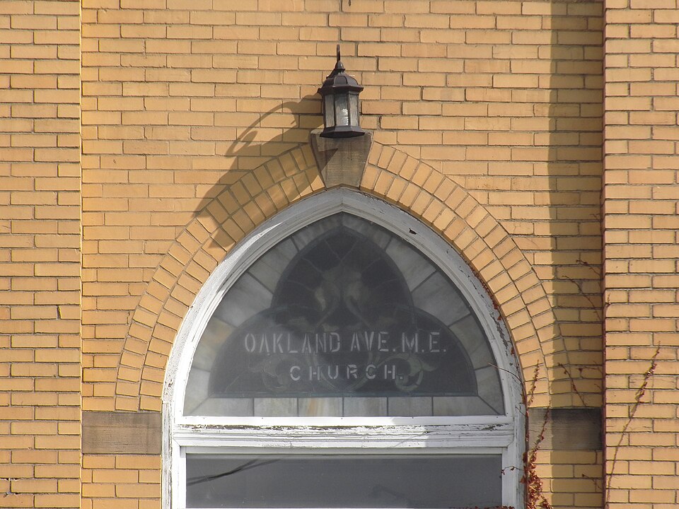 Window with inscription: Oakland Ave M. E. Church